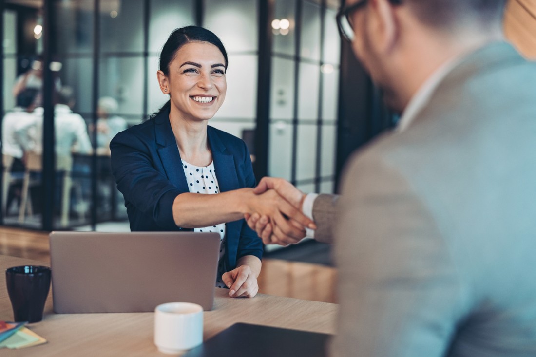 Business persons talking in the office